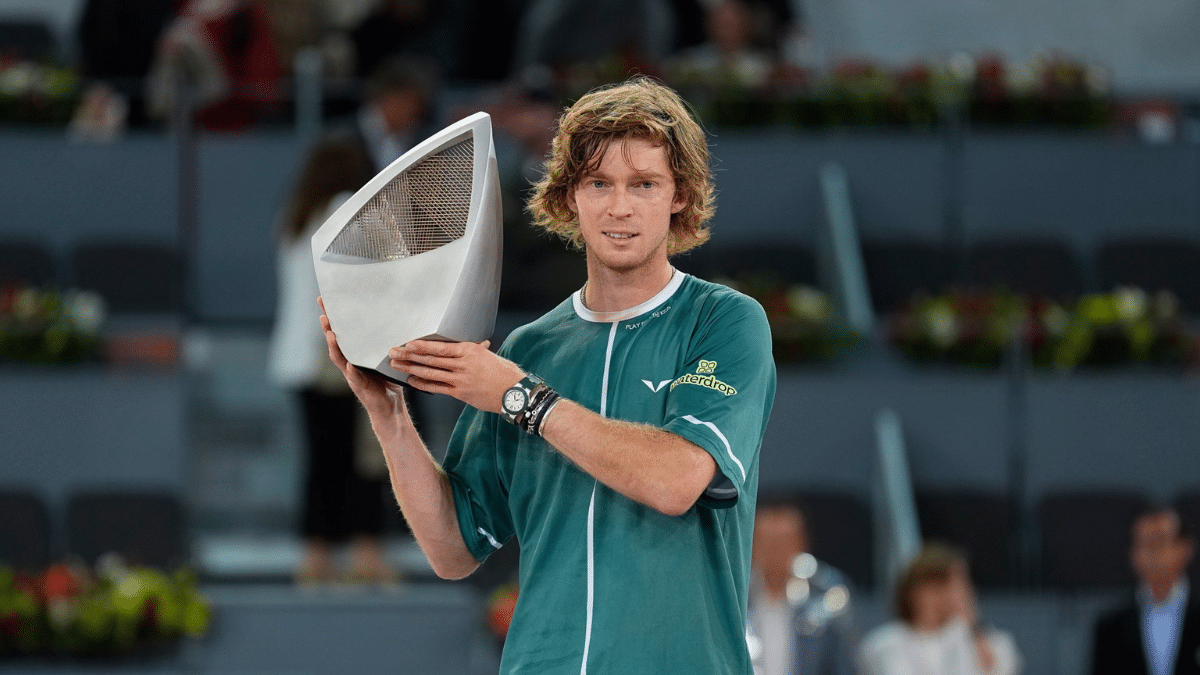 Rublev lifting his trophy